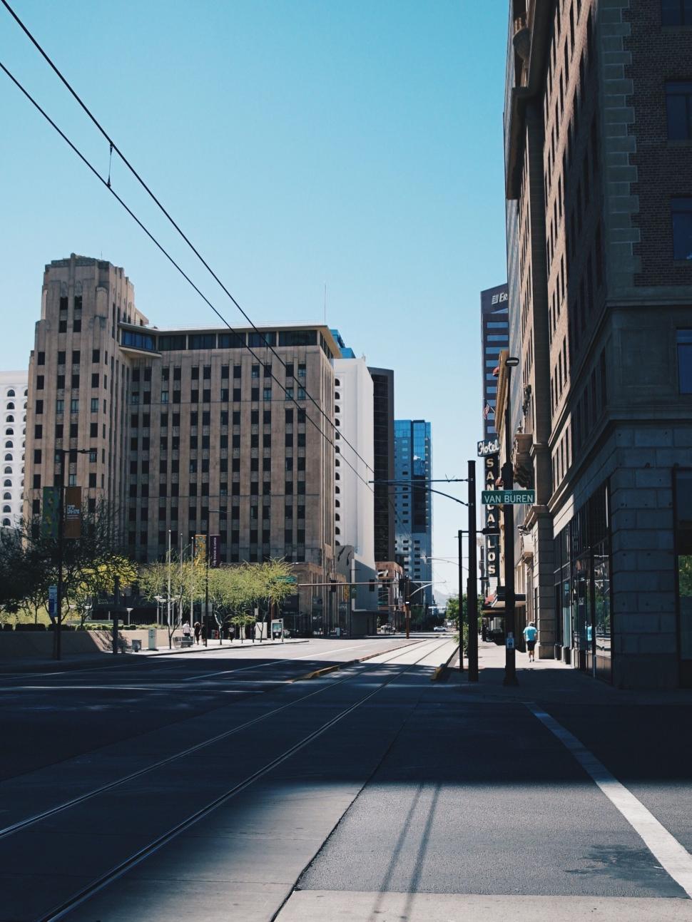 Free Image of City Street With Tall Buildings 