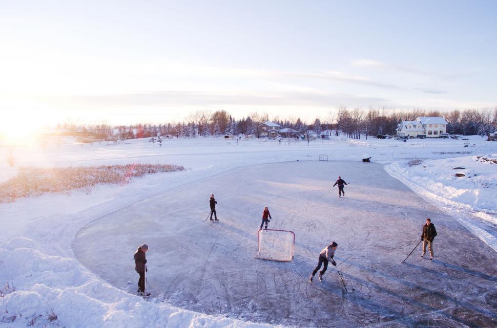 Free Image of Group of People Playing Ice Hockey 