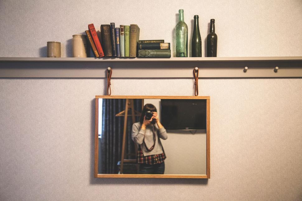 Free Image of Woman Taking Selfie in Mirror 