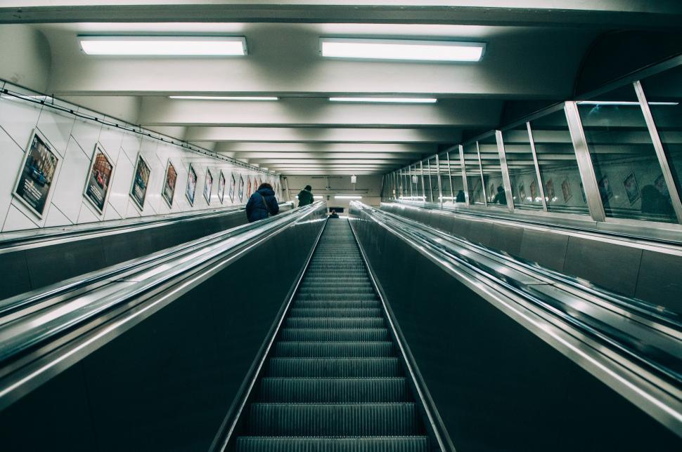 Free Image of People Riding an Escalator in a Subway Station 
