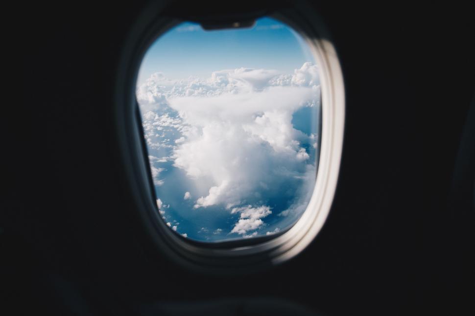 Free Image of Aerial View of Clouds From Airplane Window 
