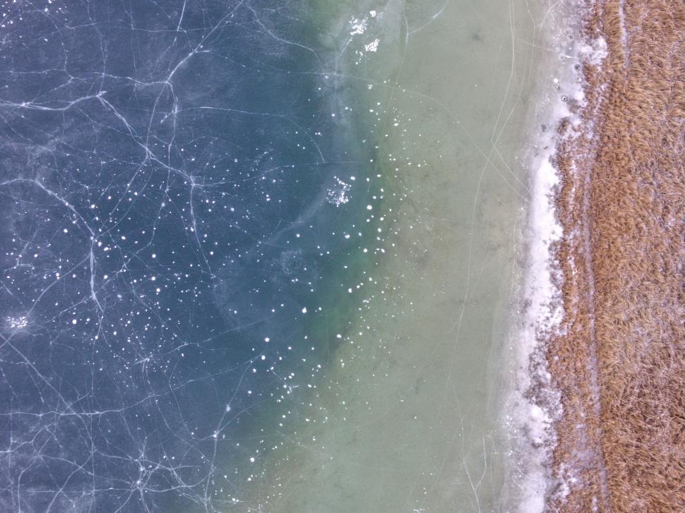 Free Image of Aerial View of Beach and Water 