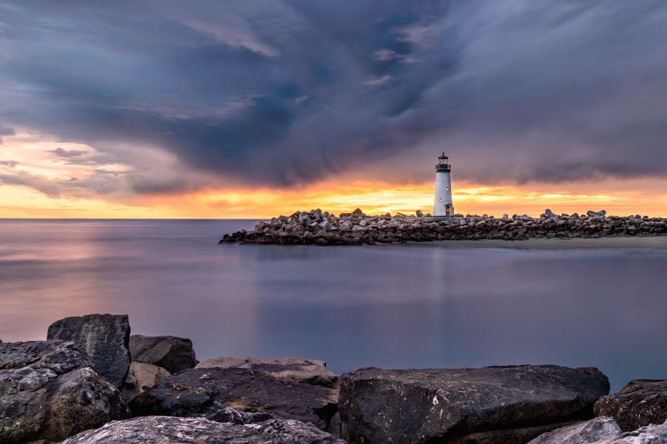 Free Image of Light House on Rocky Shore 