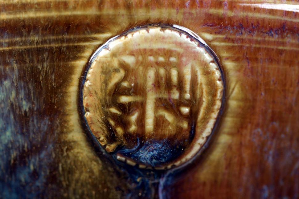 Free Image of Close Up of Brown and Blue Vase 