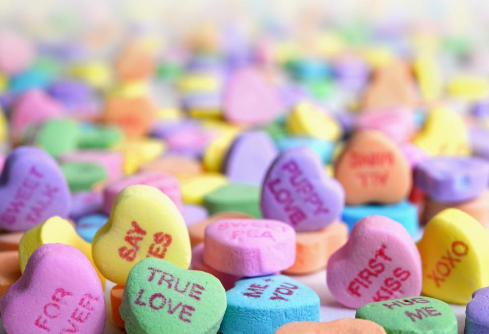 Free Image of Pile of Conversation Hearts on Table 