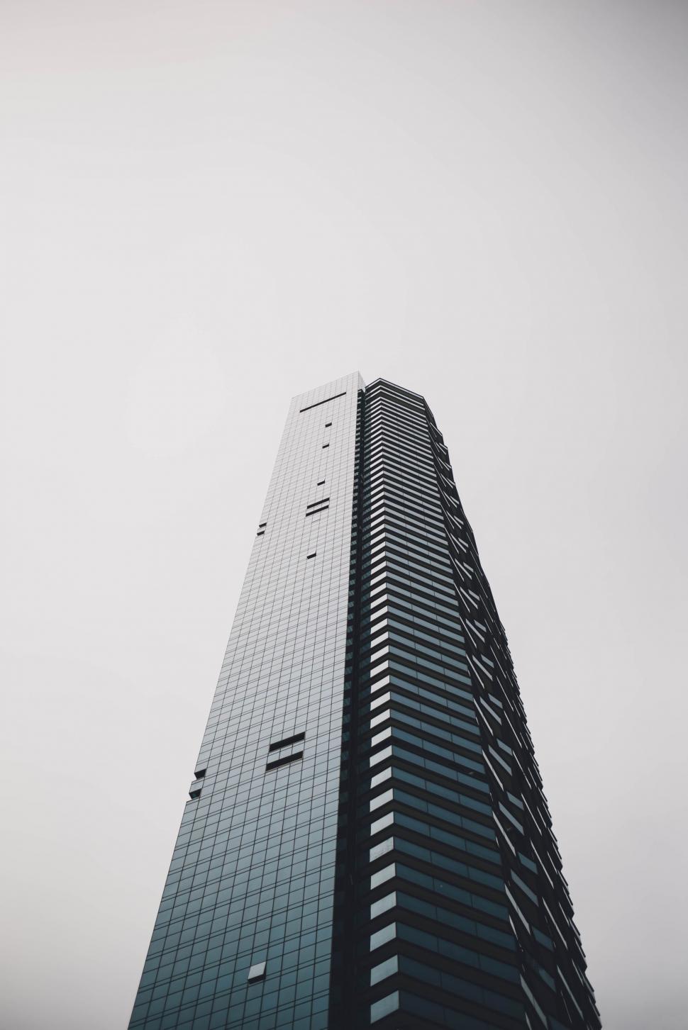 Free Image of Towering Skyscraper Reaching Into the Sky 
