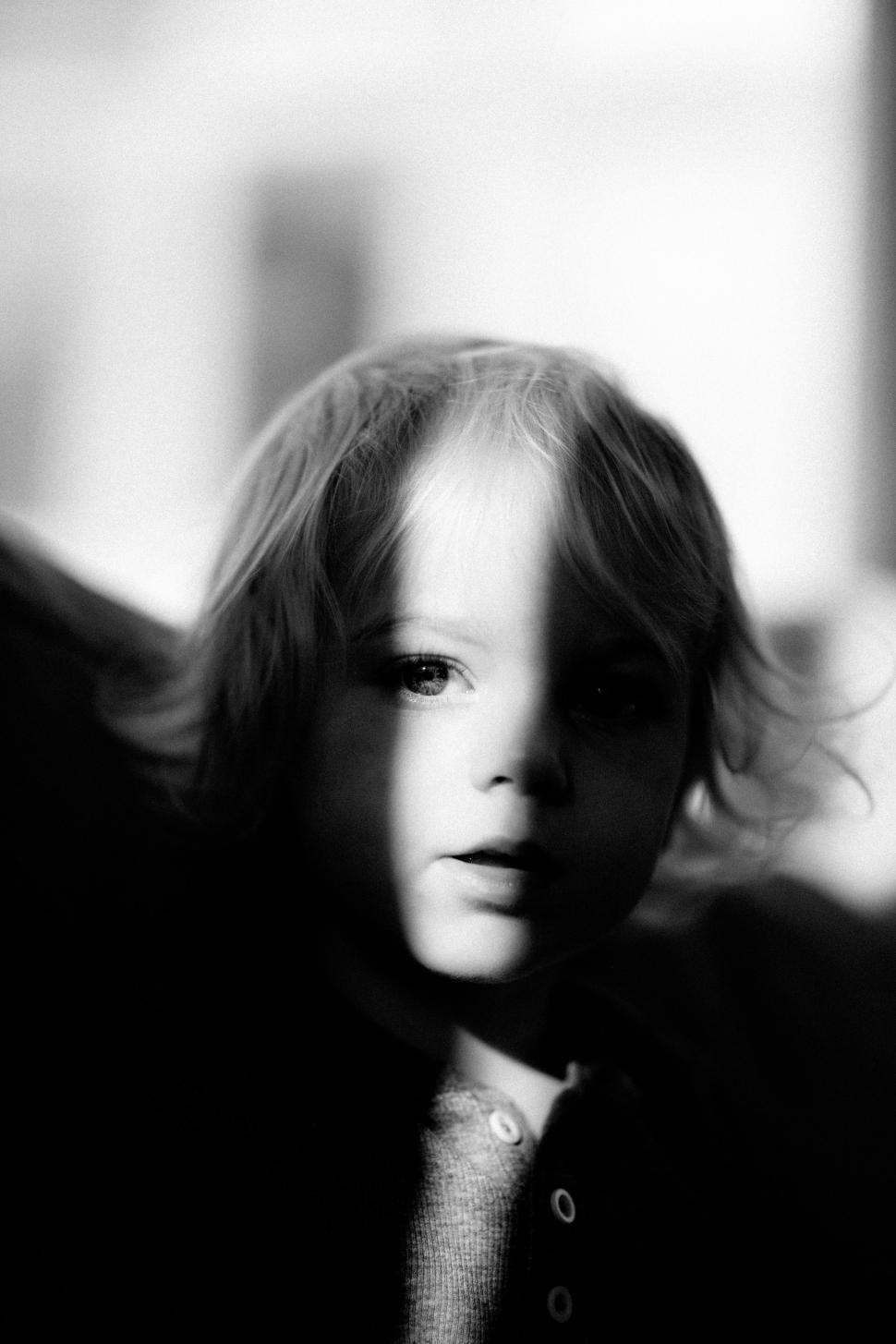 Free Image of Young Child in Black and White 