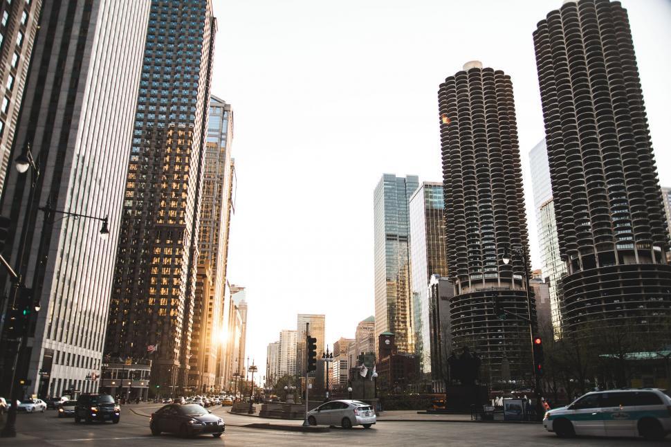 Free Image of Bustling City Street Lined With Tall Buildings 