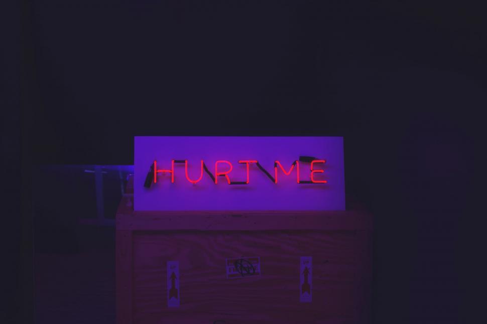 Free Image of Vibrant Neon Sign With Hurt We Illuminated 