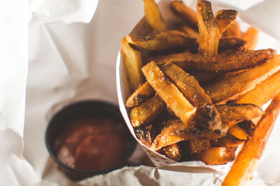Free Image of Basket of French Fries With Dipping Sauce Bowl 