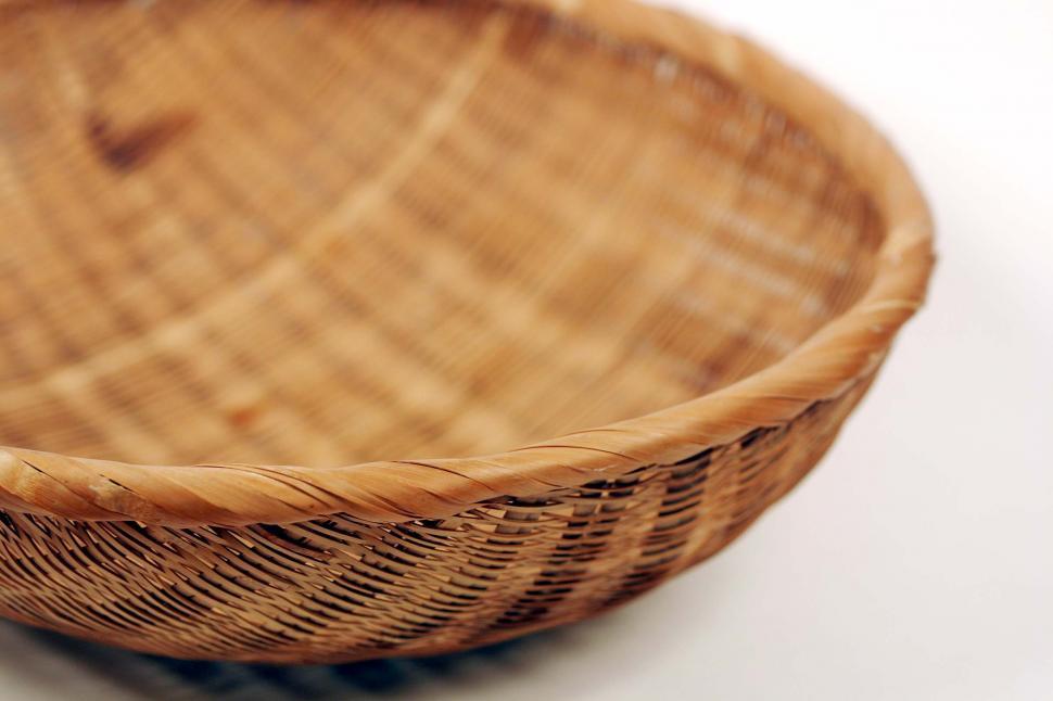 Free Image of Close Up of a Basket on a White Surface 