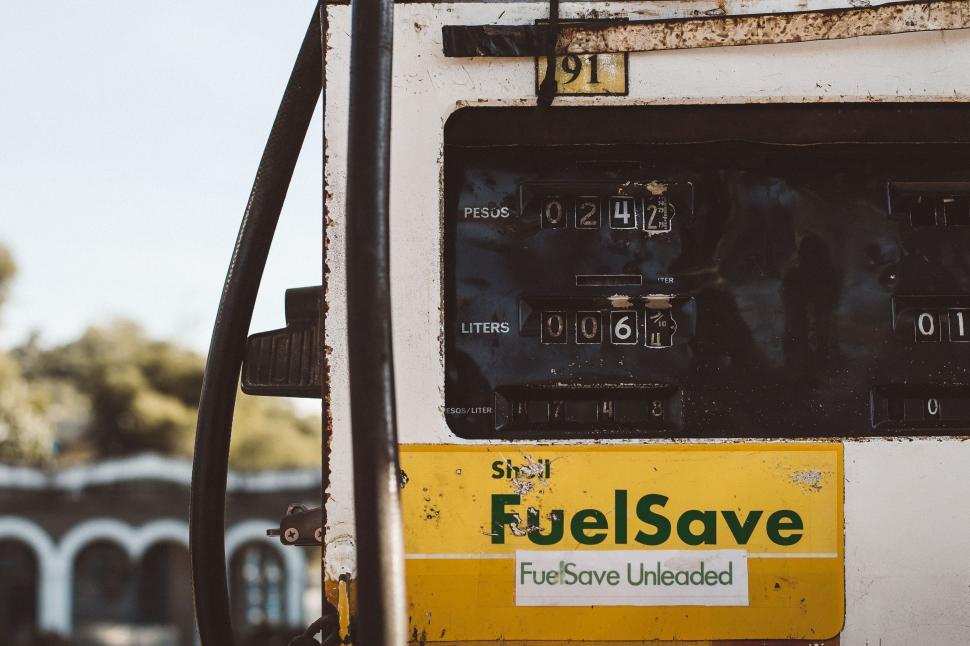 Free Image of Gas Pump With Fuel Save Sticker 