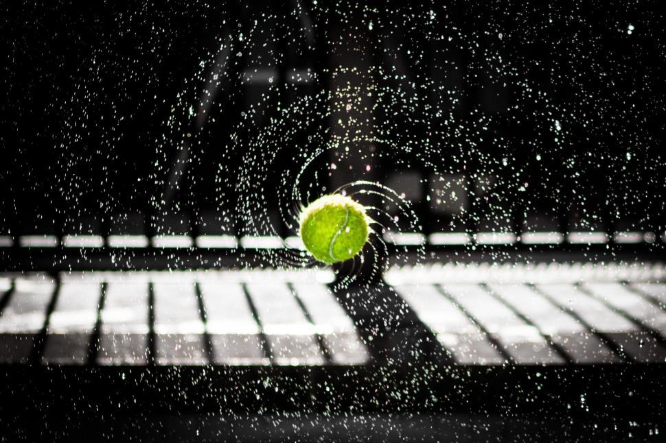 Free Image of Tennis Ball on Tennis Court 