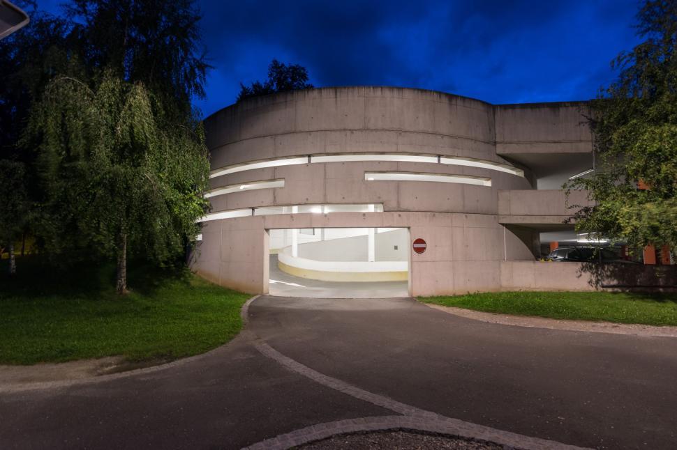 Free Image of Illuminated Building With Circular Entrance at Night 