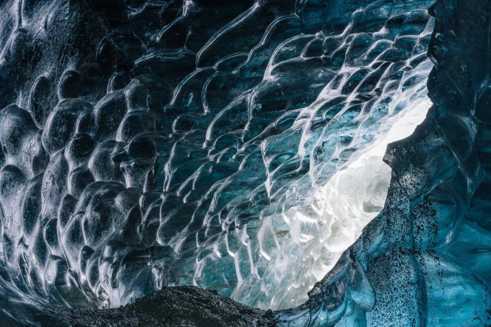Free Image of Majestic Ice Cave With Flowing Water 