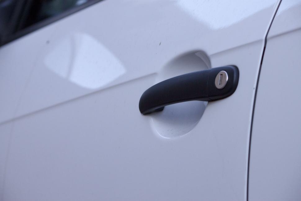 Free Image of Close Up of a Car Door Handle 