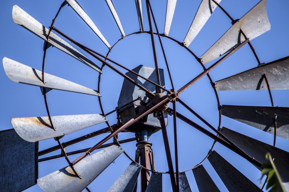 Free Image of Metal Windmill Against Blue Sky 
