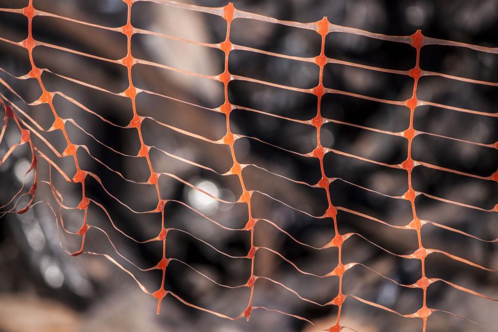 Free Image of Close Up of a Net With Orange Lines 