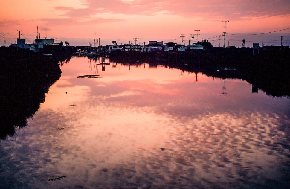 Free Image of Sunset Clouds Reflection On Water with Salmon Fishing Village 