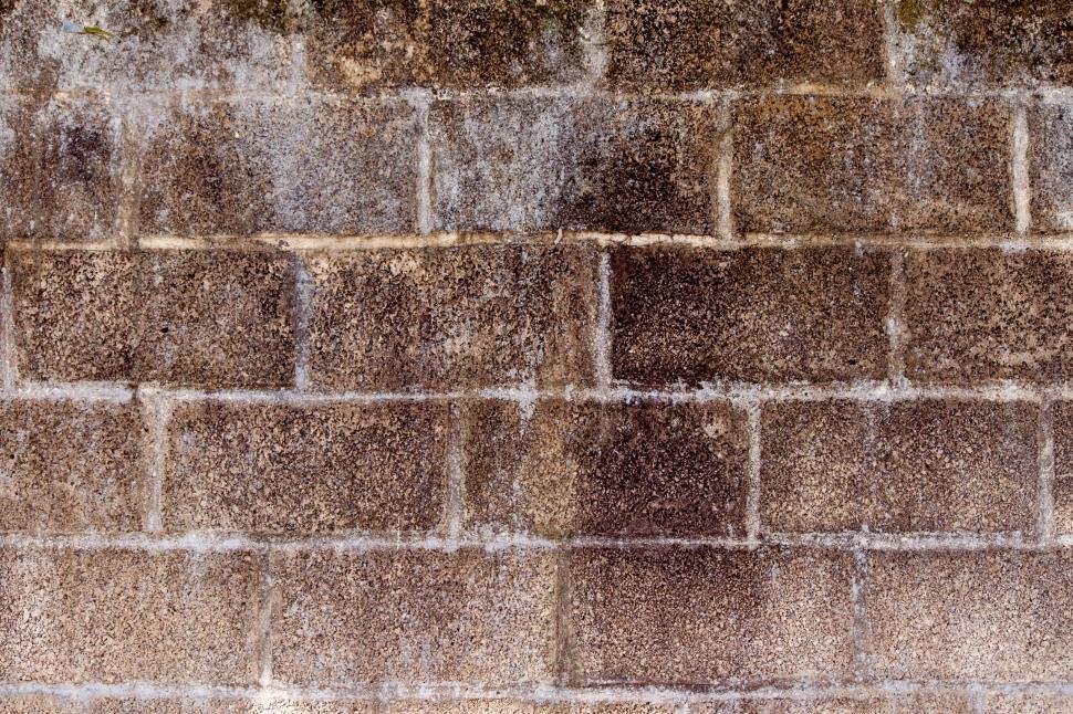 Free Image of Brown Brick Wall With Red Fire Hydrant 