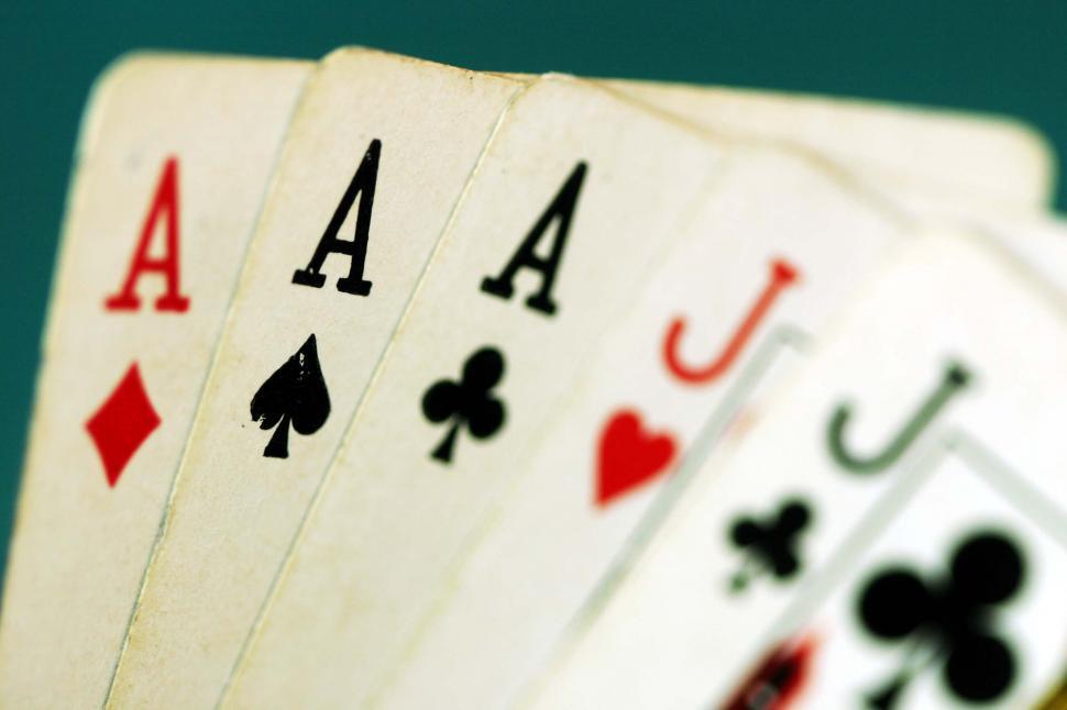 Free Image of Four of a Kind Playing Cards Arrangement 