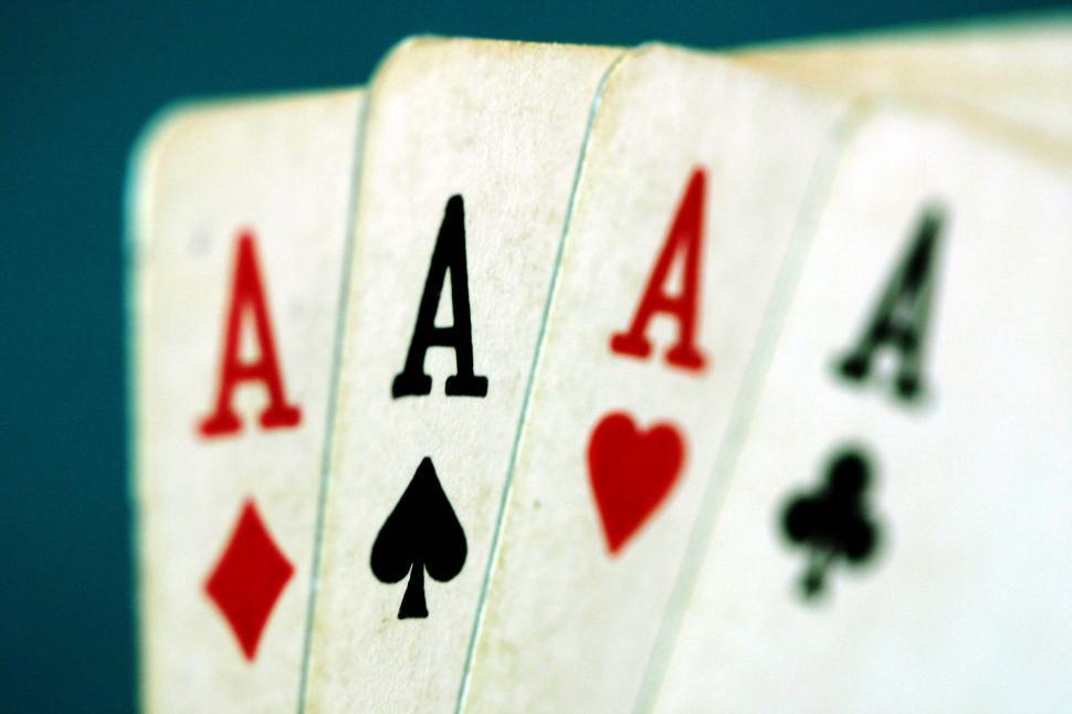 Free Image of playing cards games gambling gamble casino las vegas gaming ace ten winning hand poker four aces 