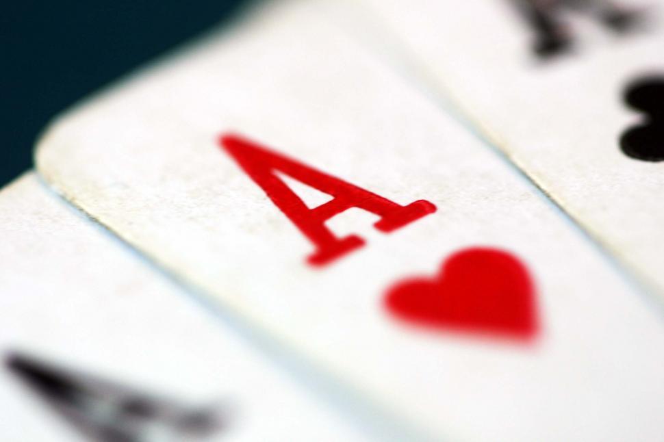 Free Image of playing cards games gambling gamble casino las vegas gaming ace ten winning hand poker aces hearts one 