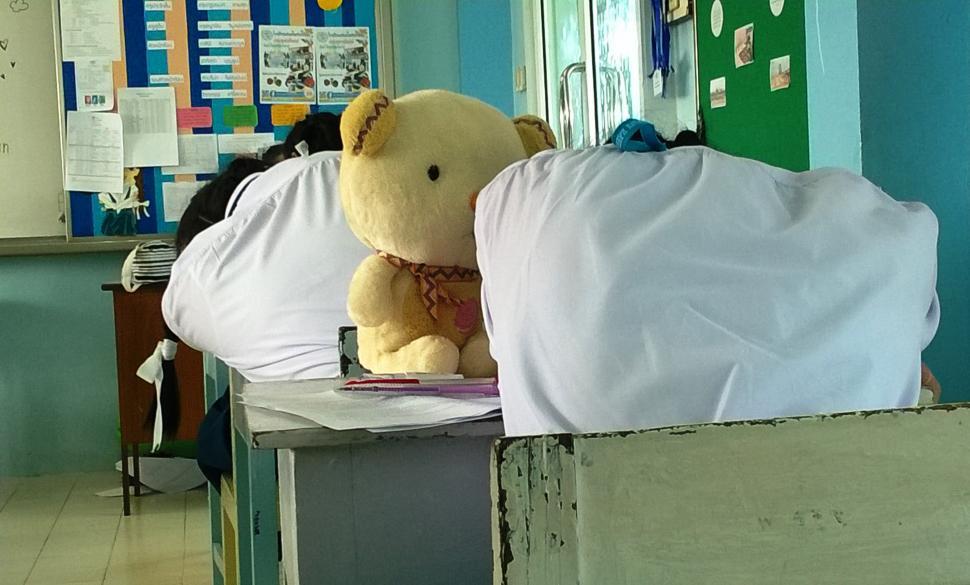 Free Image of High-School girl students sleep during an exam  