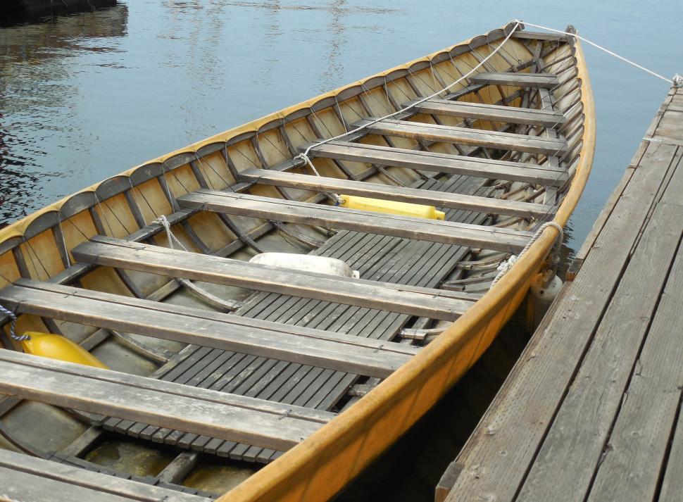 Free Image of Row Boat on Wooden Dock 