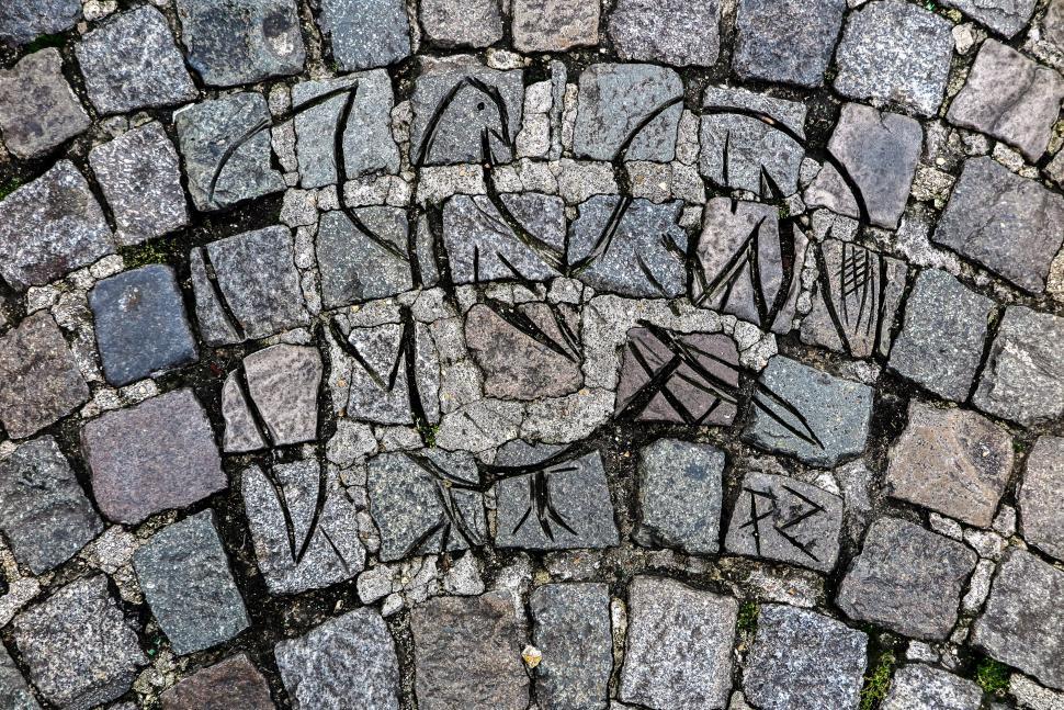 Free Image of Carving in cobblestones 