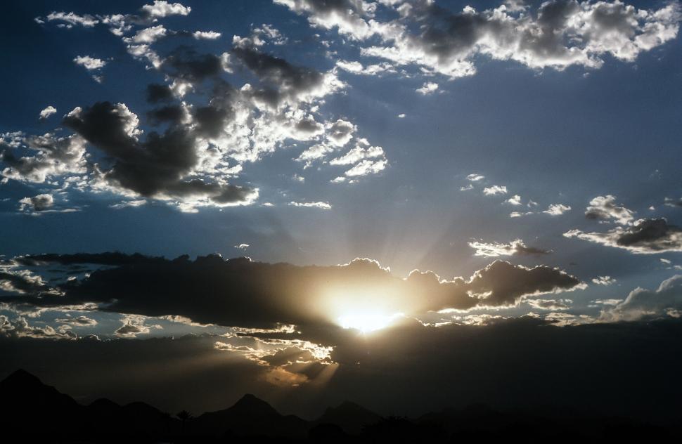 Free Image of Sunset Clouds with Sunbeams 