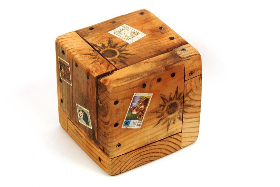 Free Image of Wooden Box Adorned With Pictures 