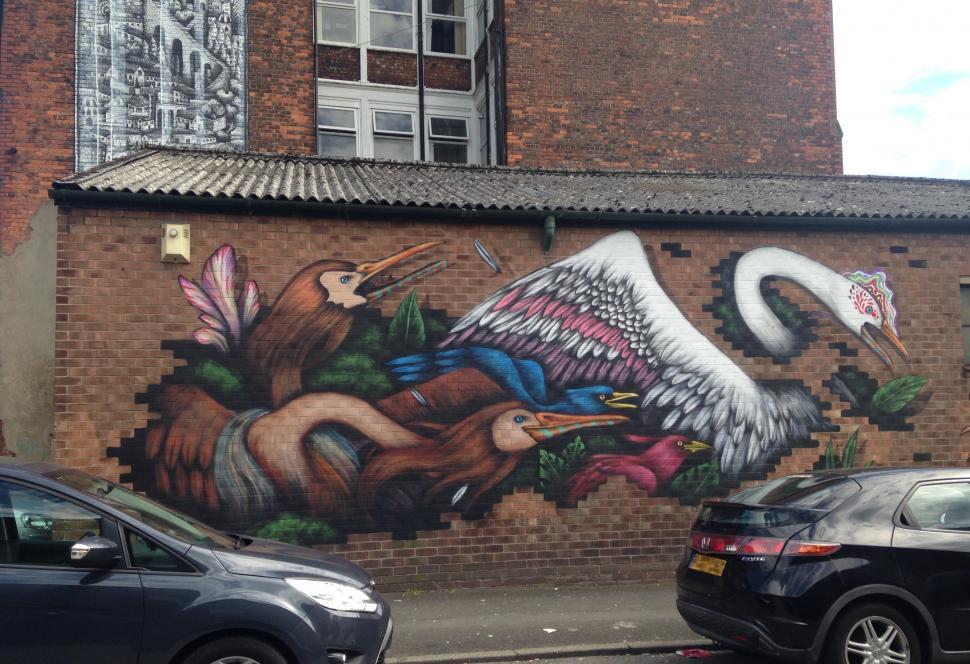 Free Image of Mean Birds Mural from Street 