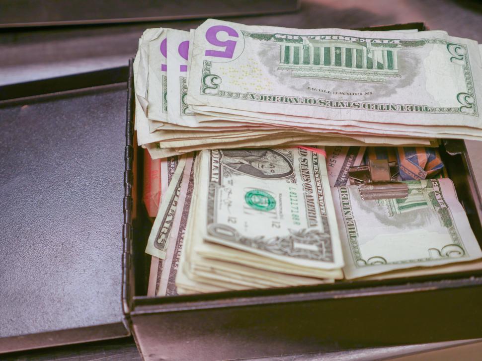 Free Image of Cash in a black box 