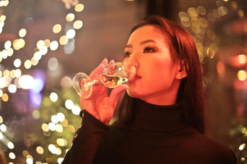 Free Image of Young Woman Drinking Wine 