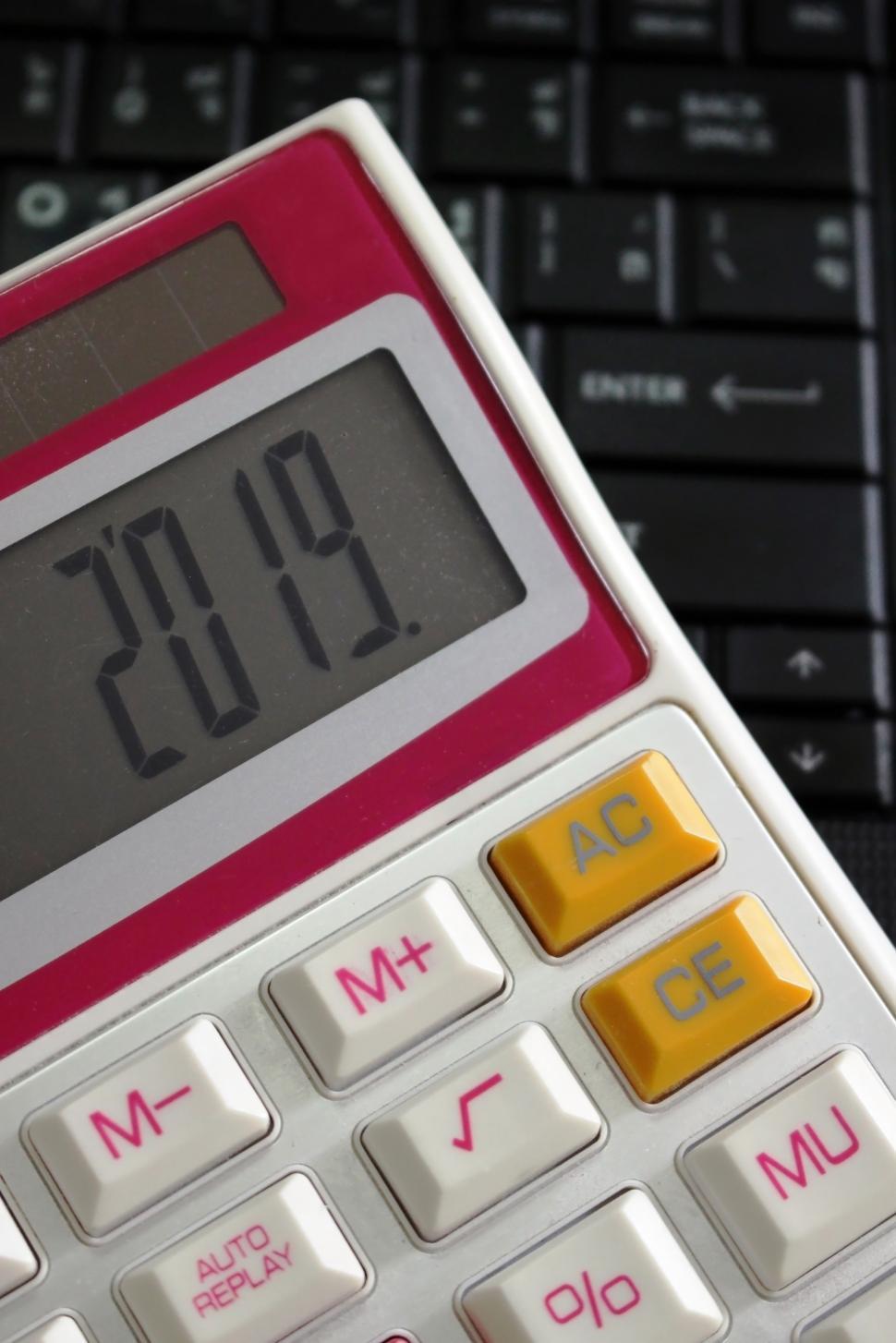 Free Image of 2019 on a Calculator Screen on a Computer Keyboard  