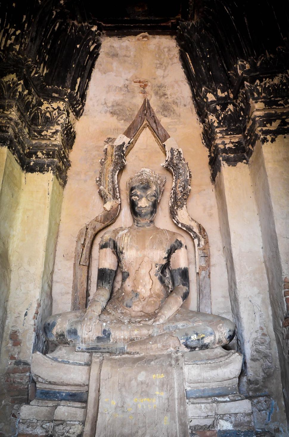 Free Image of Buddha Statue in Crumbling Ruins 