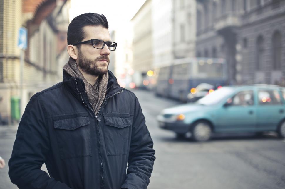 Free Image of Young Bearded Man Standing On The Street 