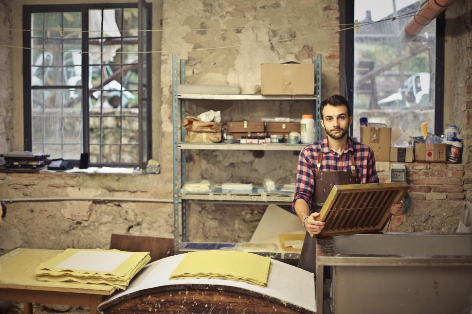 Free Image of Young Bearded Man Working In Paper Mill 