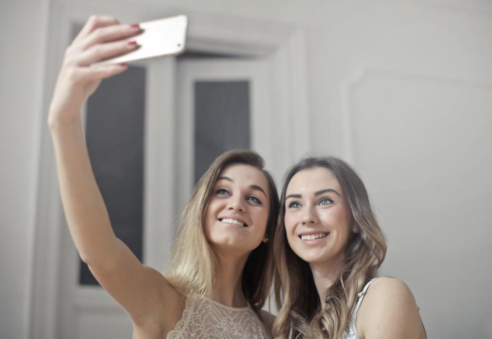 Free Image of Two Women taking a selfie together 