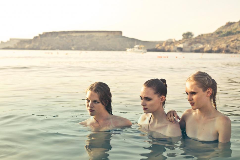Download Free Stock Photo of Three Female Fashion Models Swimming In Sea 
