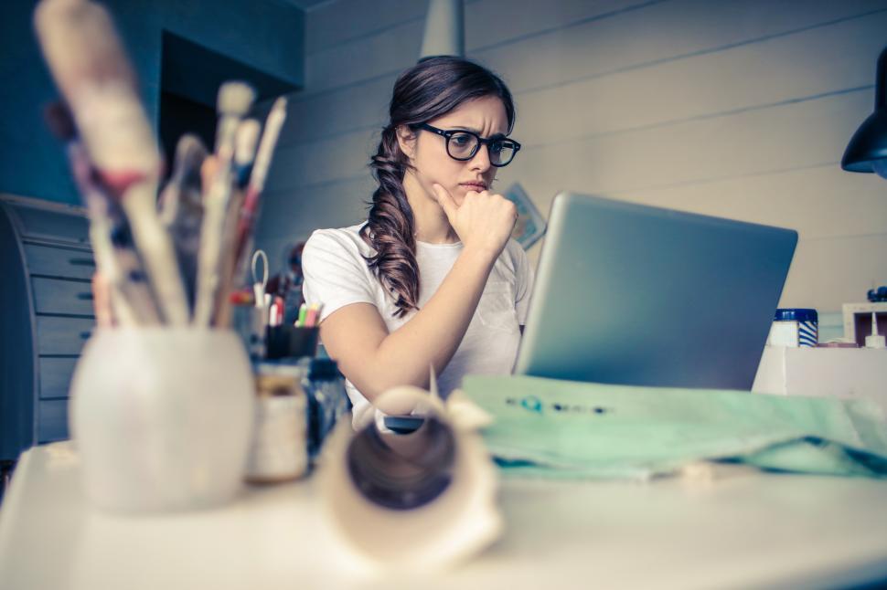 Free Image of A young woman working on her laptop 