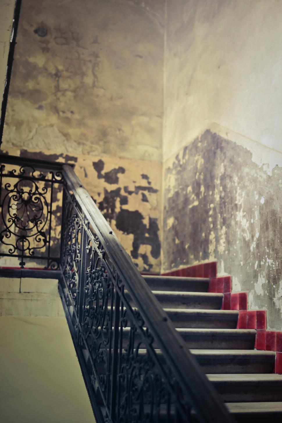 Free Image of Old staircase with metal railings 