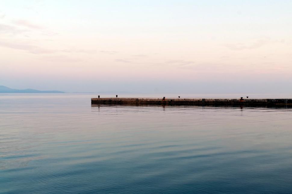 Free Image of The pier and calm ocean 