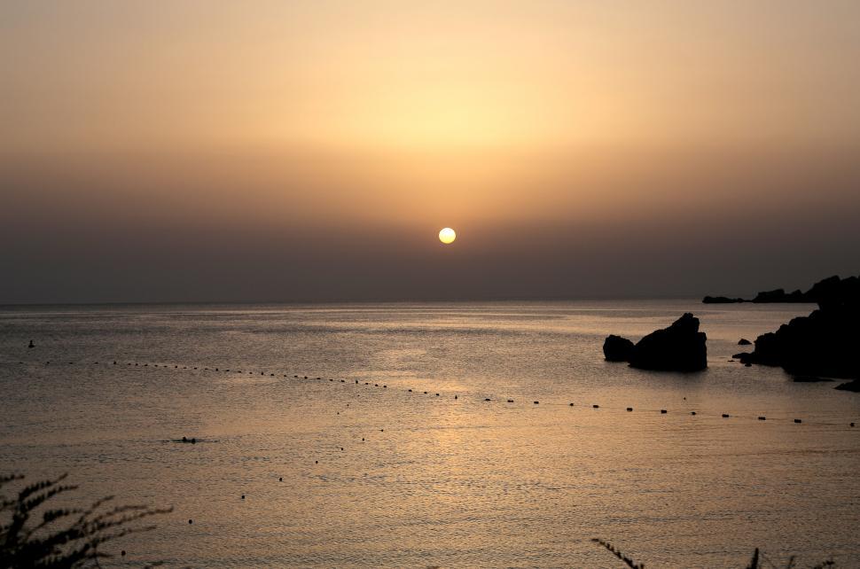 Free Image of A sunset view of horizon 