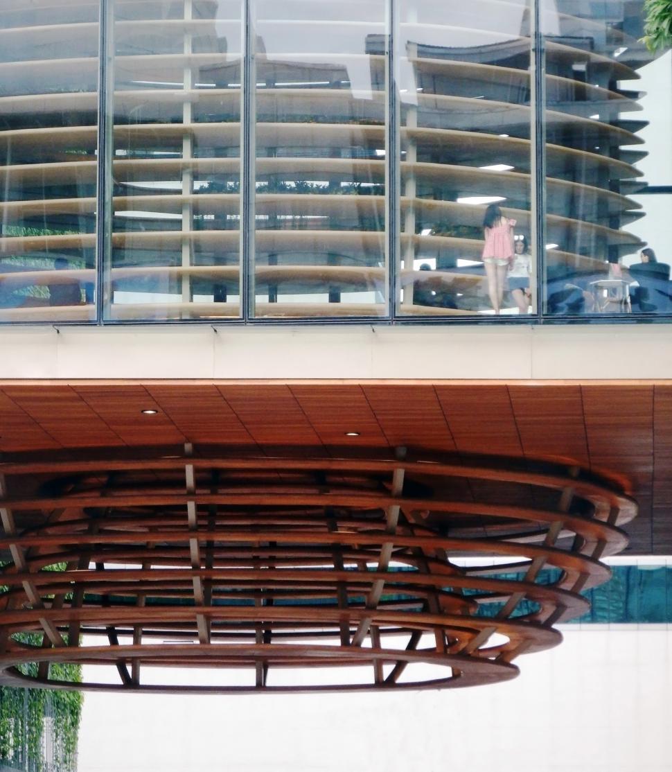 Free Image of Archidecturial details of a large wooden cone shaped feature on a highrise building  