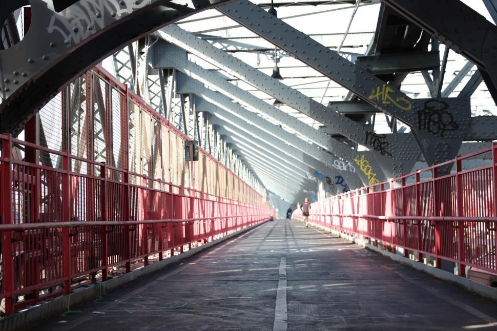Free Image of A caged-design iron walking bridge 