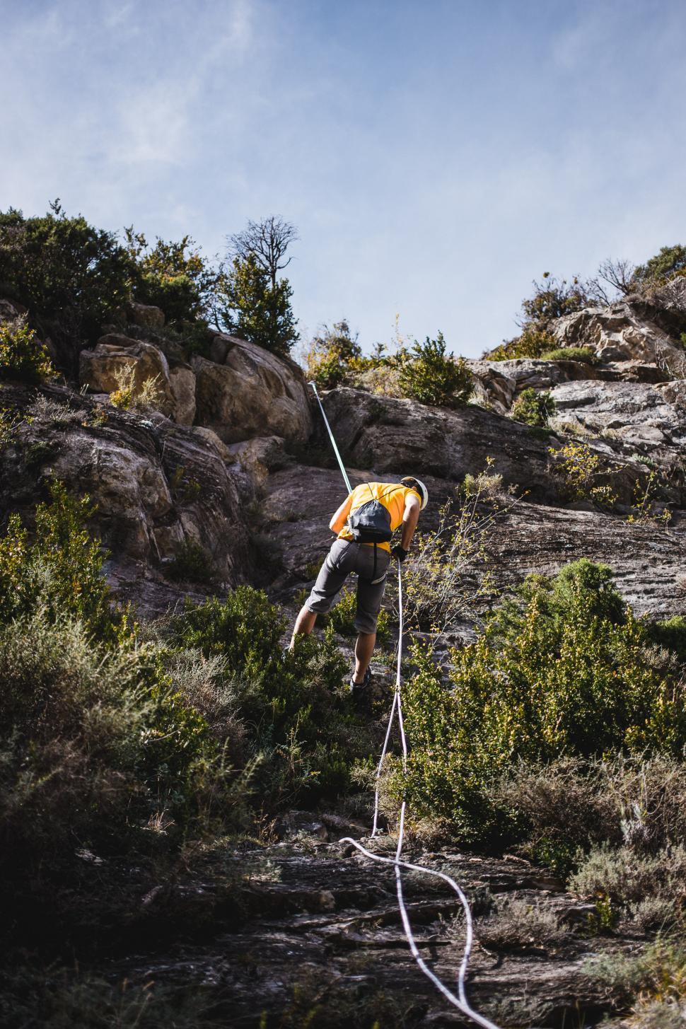 Free Image of A climber repelling a mountain 