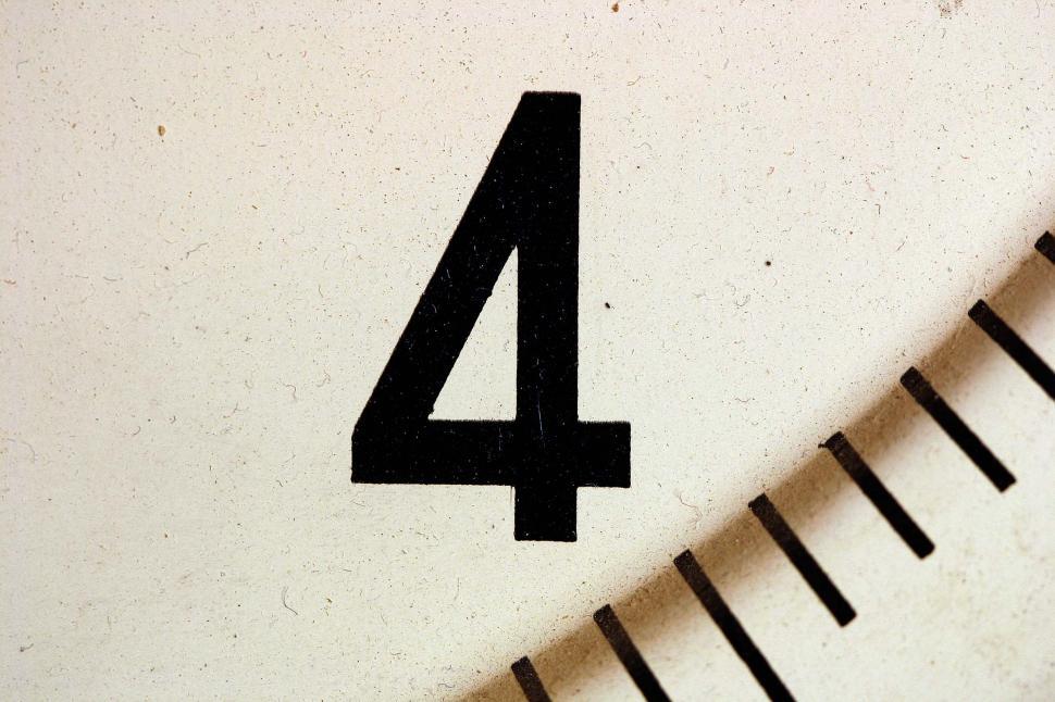 Free Image of Close Up of the Number Four on a Clock 