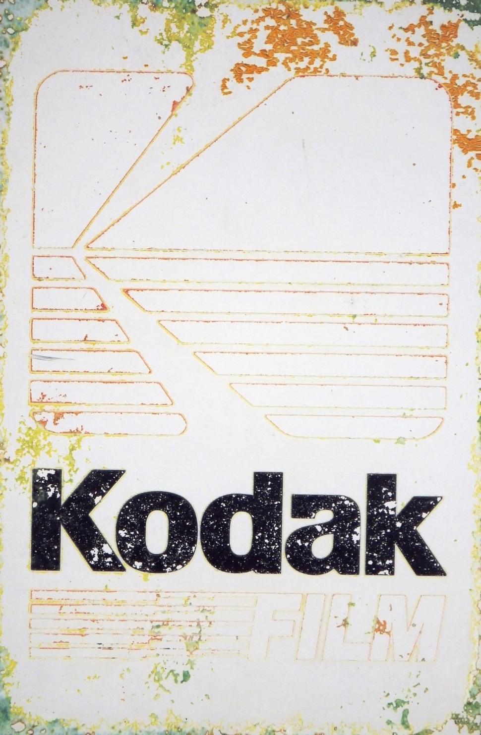 Free Image of Vintage aged advertising sign board for the Kodak camera brand  